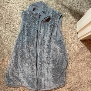 grey fluffy vest